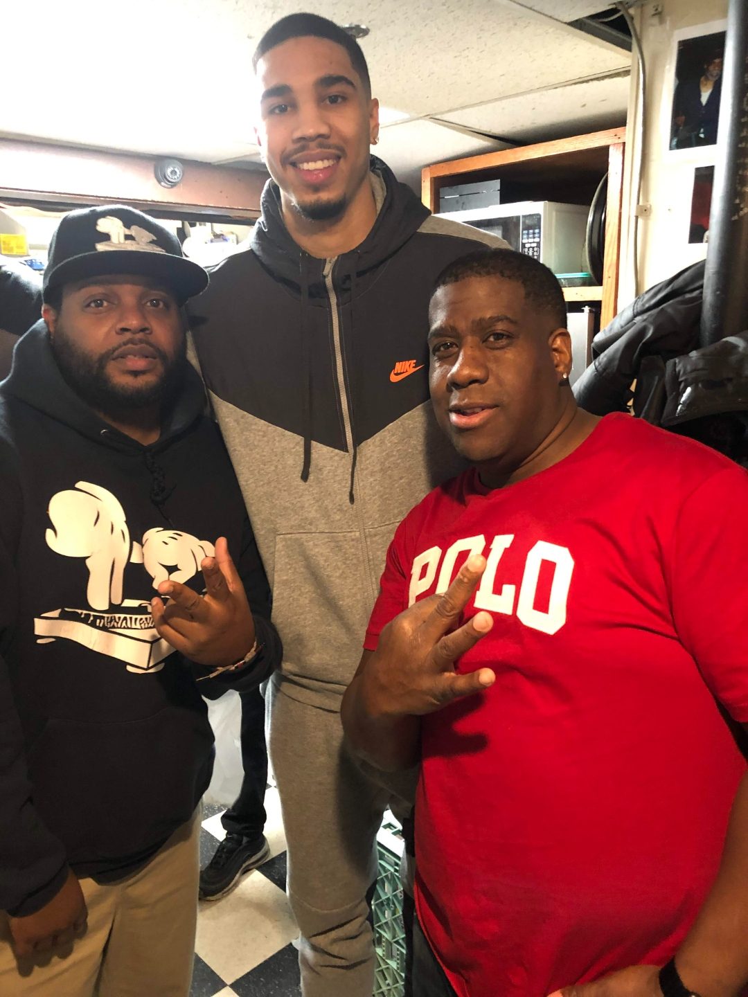 Shawn B. Hunter with guests behind the scenes at Slade's Bar and Grill in Boston